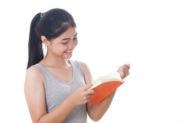 Mujeres jóvenes leyendo un libro Fotos de stock libres de derechos