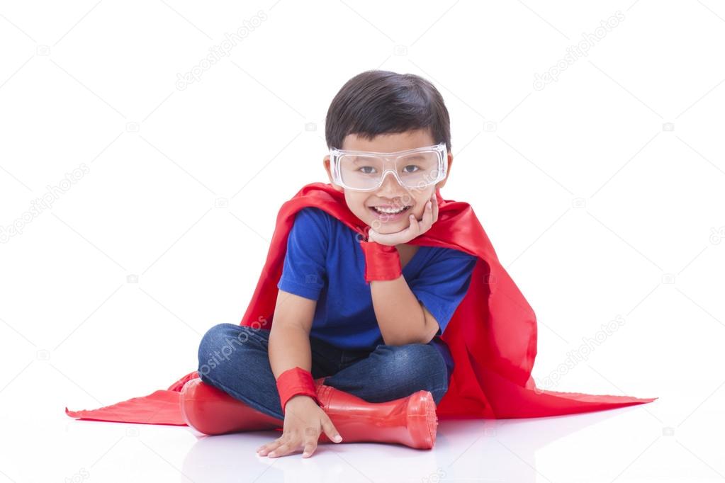 Little boy pretending to be a superhero