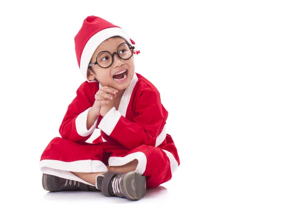 Little boy wearing Santa Claus uniform. — Stock Photo, Image