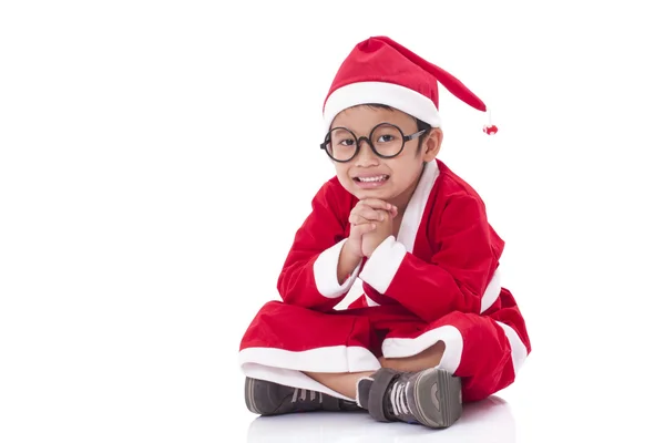 Kleine jongen dragen Santa Claus uniform. — Stockfoto