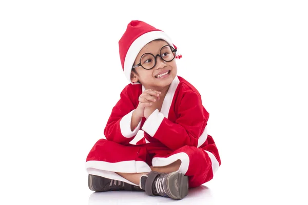Kleine jongen dragen Santa Claus uniform. — Stockfoto