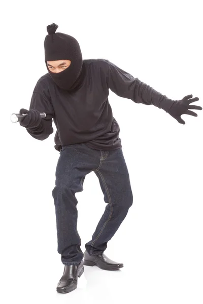 Thief holding flashlight, — Stock Photo, Image