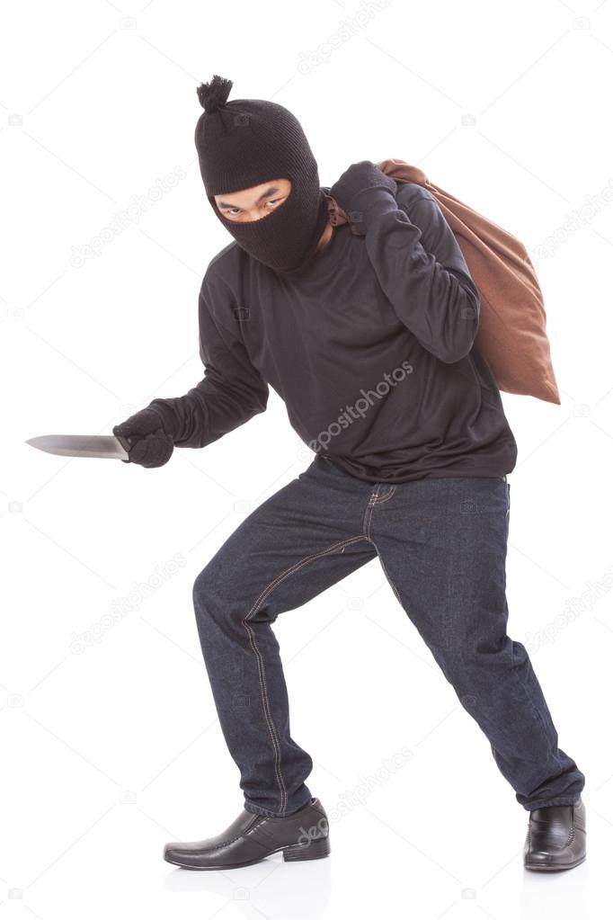 Thief with bag and holding knife