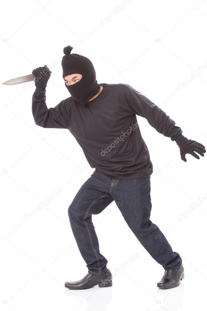 Man in a mask with a knife