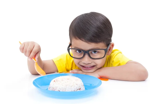 Ragazzino mangiare riso . — Foto Stock