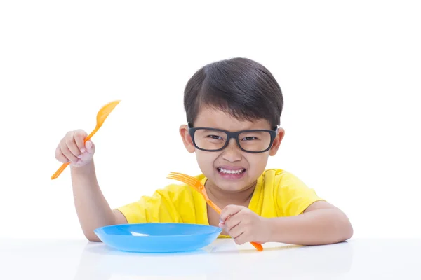Kleine jongen eten rijst. — Stockfoto