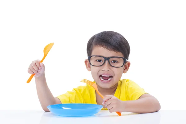 Küçük çocuk pirinç yeme. — Stok fotoğraf