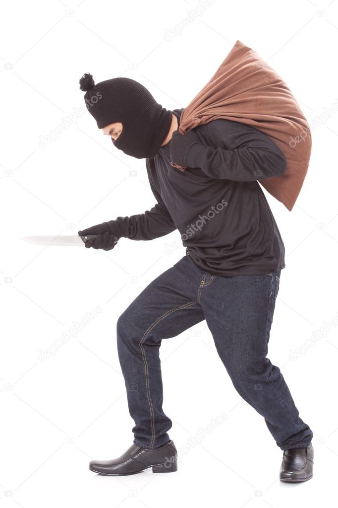 Thief with bag and holding knife