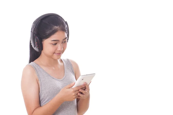 Mujeres jóvenes con tablet PC y auriculares . — Foto de Stock