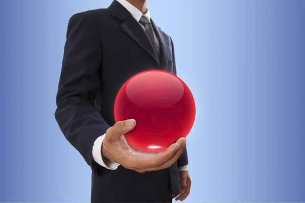 Businessman hand holding red crystal ball. — Stock Photo, Image