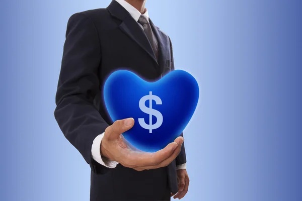 Businessman with dollar sign icon. — Stock Photo, Image