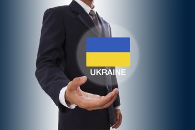 İşadamı el gösteren Ukrayna bayrağı