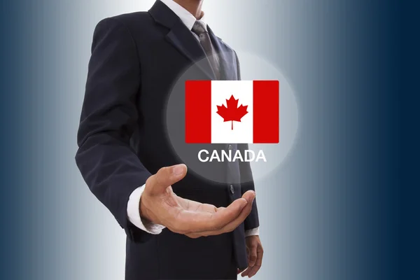 Empresario mano mostrando Bandera de Canadá — Foto de Stock