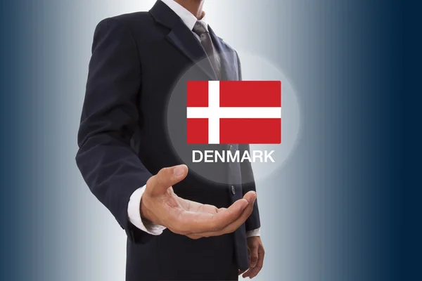 Businessman hand showing Denmark Flag — Stock Photo, Image