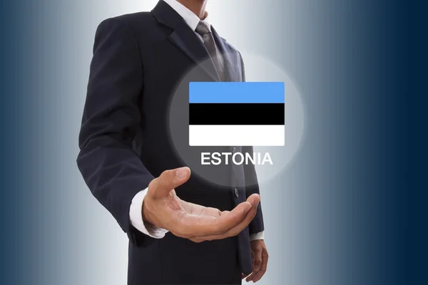 Empresario mano mostrando Bandera de Estonia —  Fotos de Stock