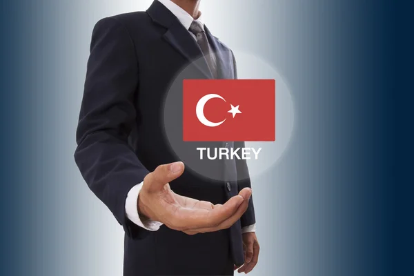 Affärsman hand visar Turkiet flagga — Stockfoto