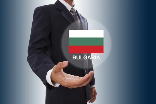 Uomo d'affari mano mostrando Bulgaria Bandiera — Foto Stock