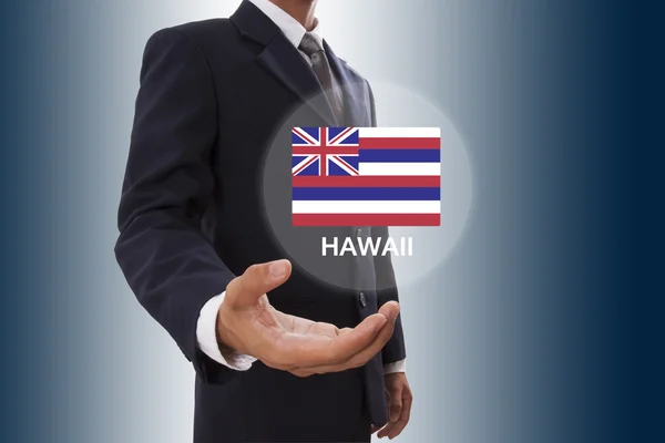 商人手显示夏威夷国旗 — 图库照片