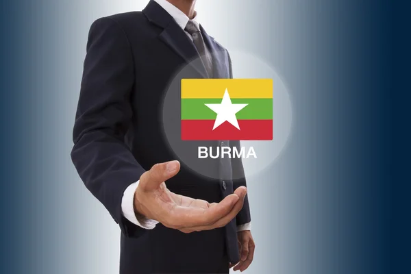 Burma bayrak gösterilen işadamı el — Stok fotoğraf