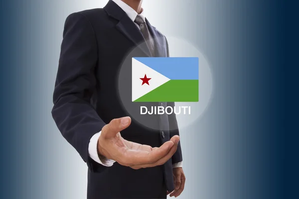 Biznesmen strony Wyświetlono Flaga Dżibuti — Zdjęcie stockowe