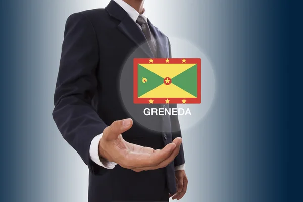 Mão de homem de negócios mostrando bandeira de Granada — Fotografia de Stock