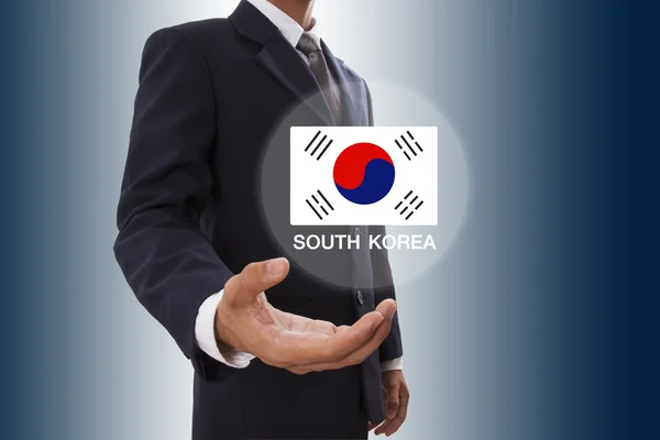 Biznesmen strony Wyświetlono flaga Korei Południowej — Zdjęcie stockowe