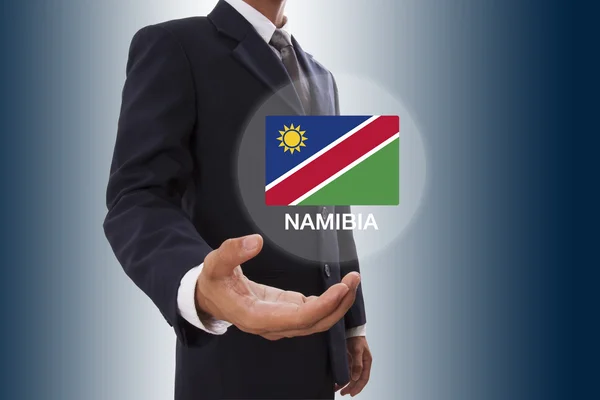 Businessman hand showing Namibia Flag — Stock Photo, Image