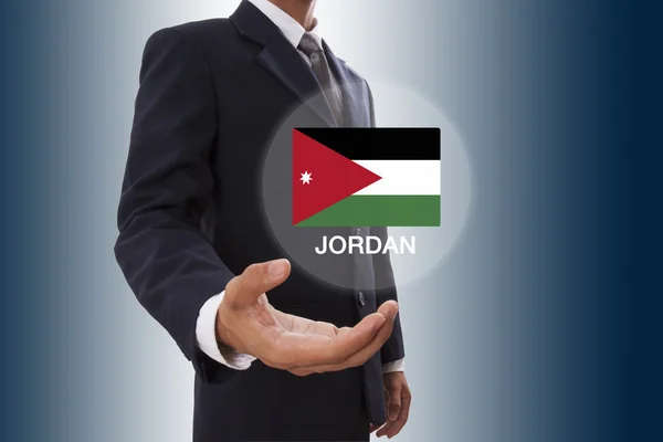 Affärsman hand visar Jordan flagga — Stockfoto