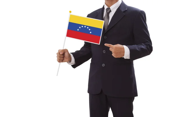 Affärsman i kostym holding Venezuelas flagga — Stockfoto