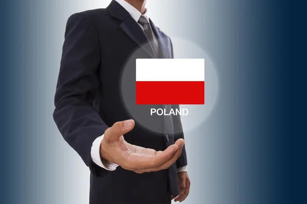 Podręcznik biznesmena pokazujący flagę Polski — Zdjęcie stockowe