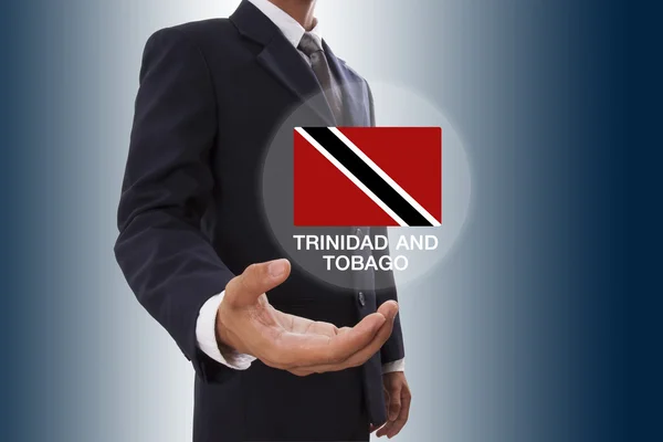 Empresario mano mostrando Bandera de Trinidad y Tobago — Foto de Stock