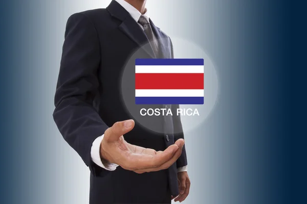 Empresario mano mostrando Bandera de Costa Rica —  Fotos de Stock