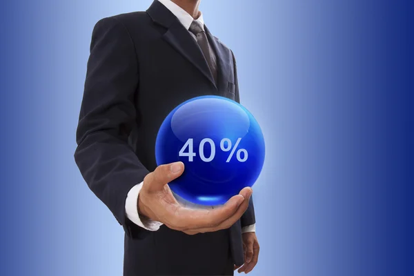 Businessman hand holding blue crystal ball with 40 percent discount — Stock Photo, Image