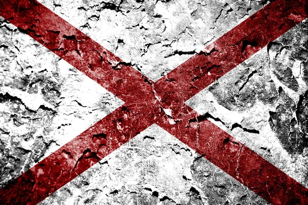 Bandera del Estado de Alabama pintada en la pared grunge — Foto de Stock