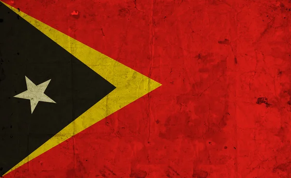 Timor Oriental Bandera sobre papel viejo —  Fotos de Stock