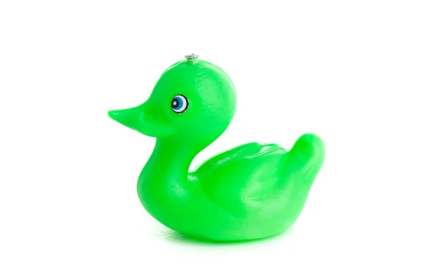 Brinquedo de pato verde no fundo branco — Fotografia de Stock