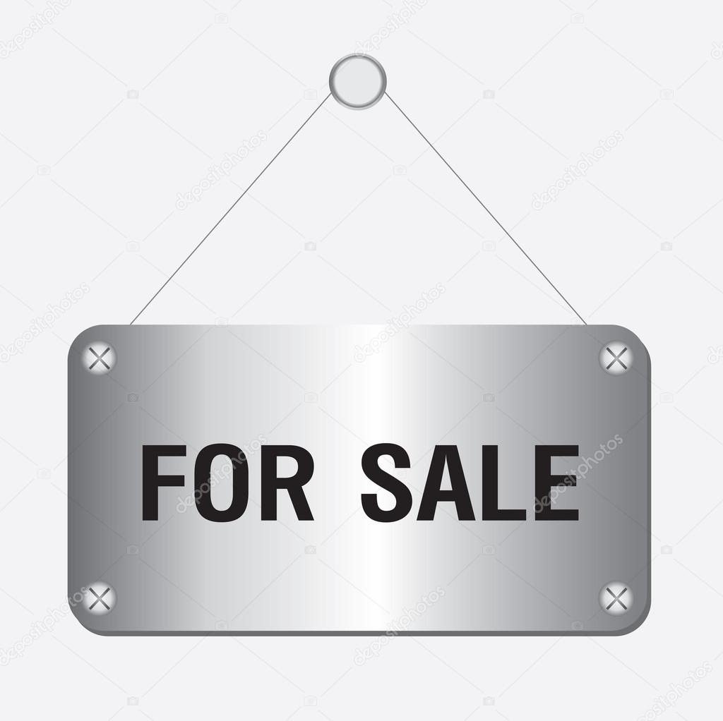 Silver metallic for sale sign hanging on the wall