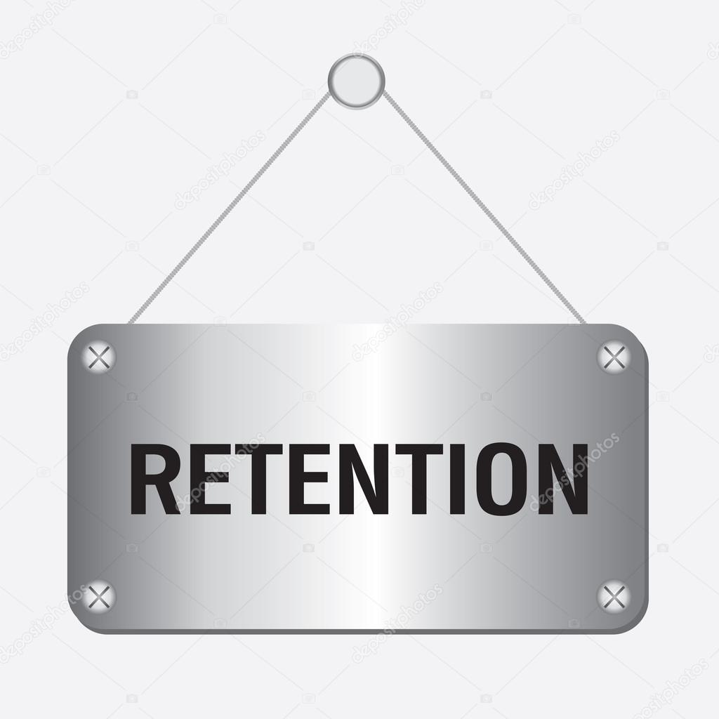 Silver retention sign hanging on the wall