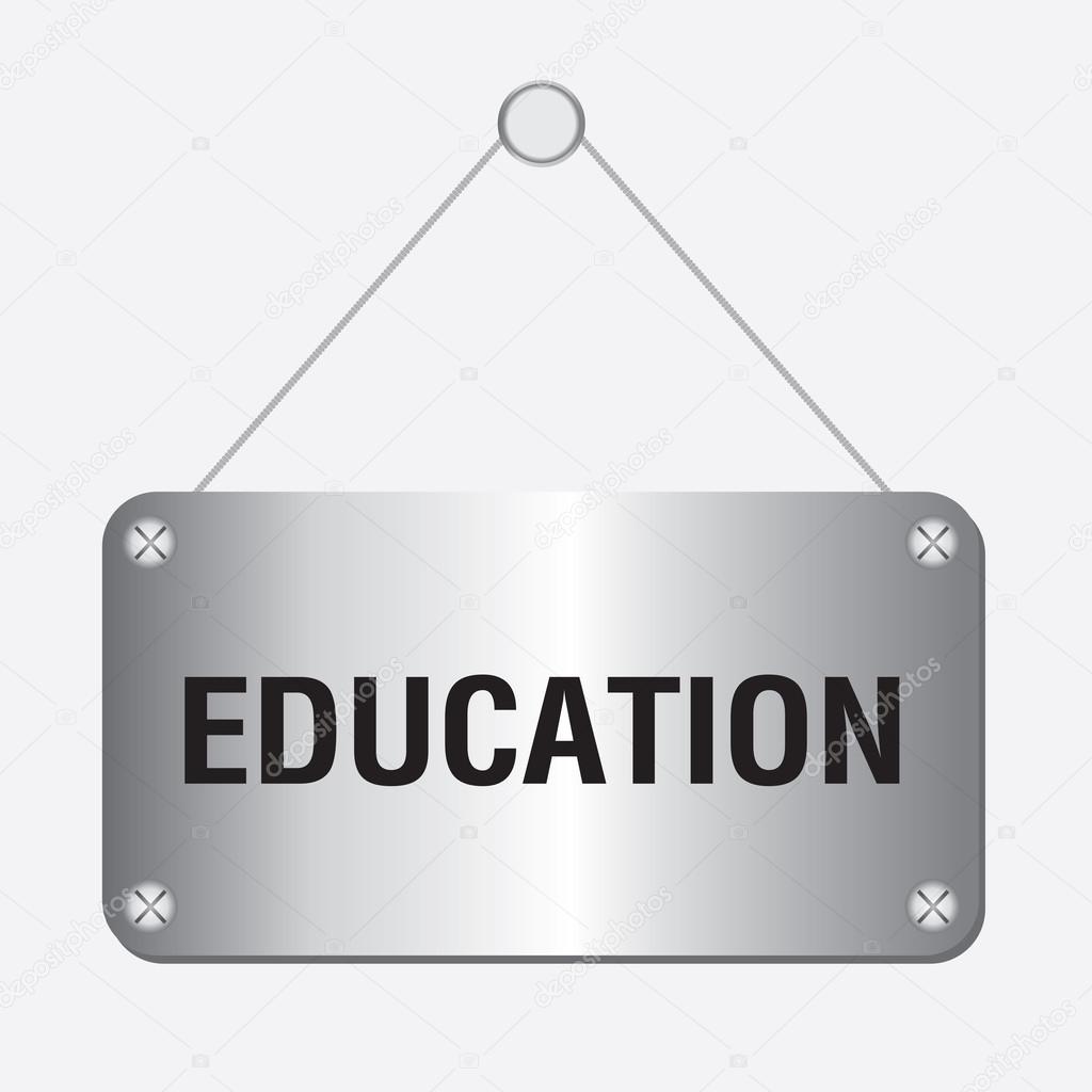Silver metallic education sign hanging on the wall