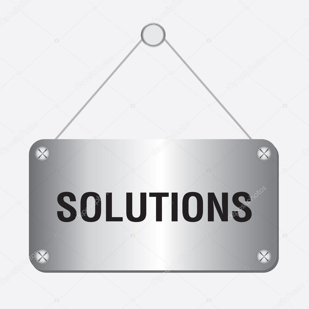 Silver metallic solutions sign hanging on the wall