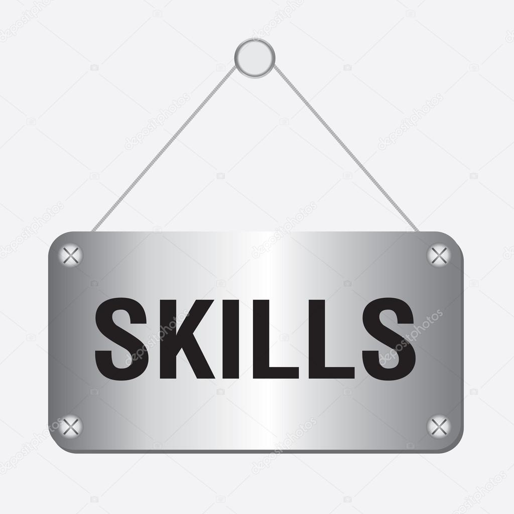 Silver metallic skills sign hanging on the wall