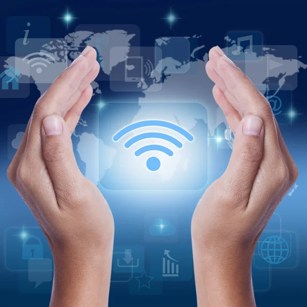 Hand showing wifi icon symbol on screen. business concept — Stock Photo, Image