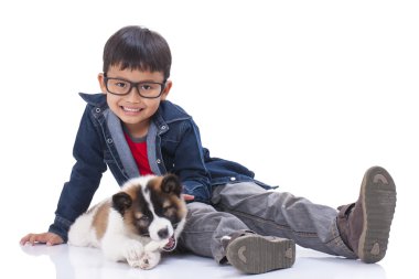 çocuk ve Tay Bangkaew köpek yavrusu