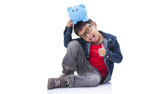 Little boy with piggy bank — Stock Photo, Image