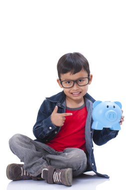 little boy with piggy bank clipart