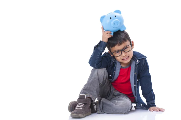Little boy with piggy bank — Stock Photo, Image