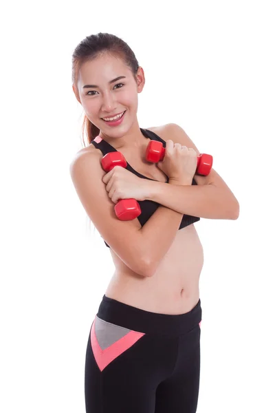 Спортивная женщина делает упражнения с поднятием тяжестей — стоковое фото