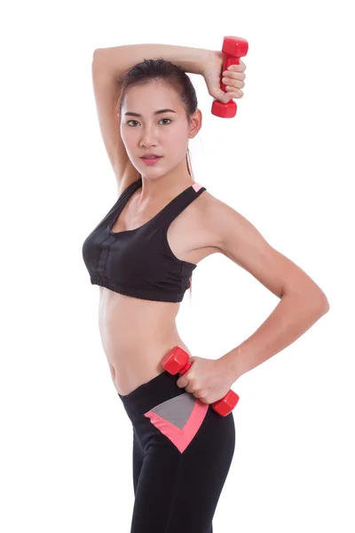 Sport kvinde gør motion med løft vægte - Stock-foto