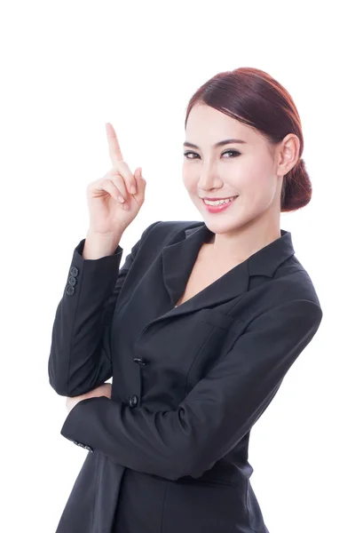 Portrait of young businesswoman pointing up — Stock Photo, Image