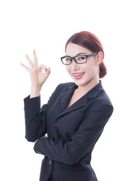 Beautiful businesswoman showing ok sign — Stock Photo, Image